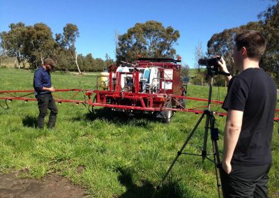 A Wrenhaven technician weed spraying using a back pack and weed spraying tool in South Australia